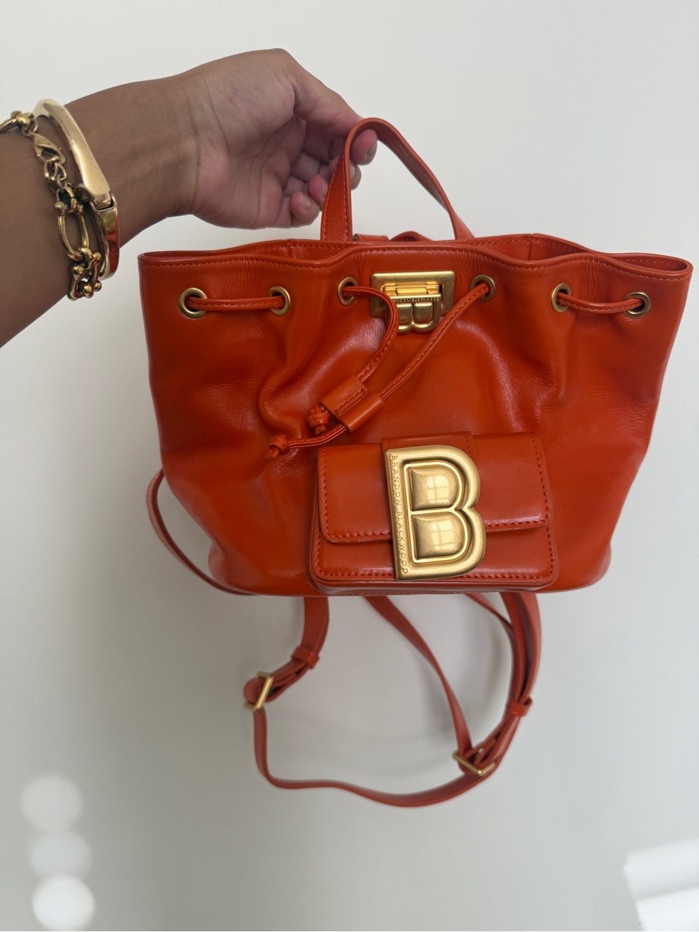 Brandon Blackwood Orange Leather Drawstring Mini Bucket Bag